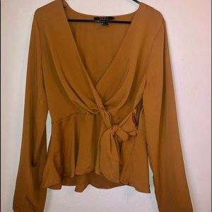 Women’s forever 21 burnt orange blouse shirt.